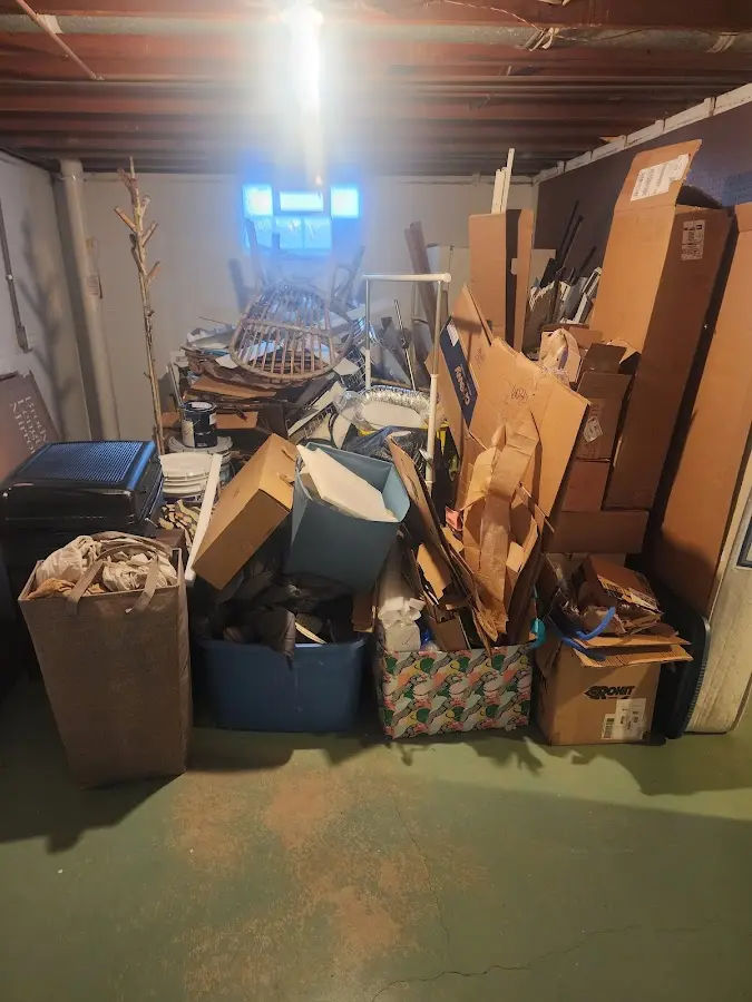 Roll-off dumpster container at job site for 4 Yard Dumpster Rental in Iuka